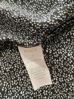 Super soft polka dot wrap dress by Ojala. Size M. Excellent condition.